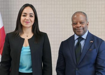 Faride Raful junto a Todd D. Robinson